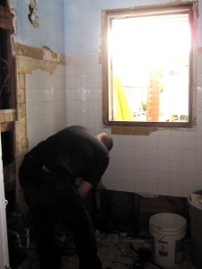 ripping out the walls, tiles, windows