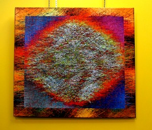 smaqll threads are glued on the surface of this canvas piece